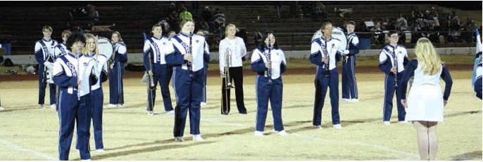 Cordell Band Recognizes Long-Time “Voice Of The Pride” At Halftime