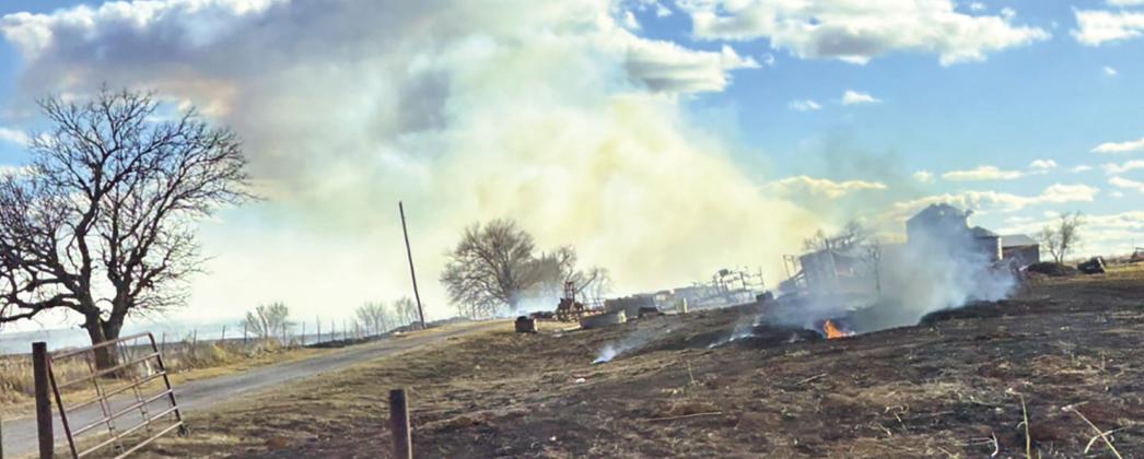 LEFT: A large grass fire located east of Cordell last week created a huge plume of smoke and placed homes, barns, and livestock at risk. Firefighters jumped into action to contain the fire and nobody was injured. PHOTOS BY SAXON FLORES