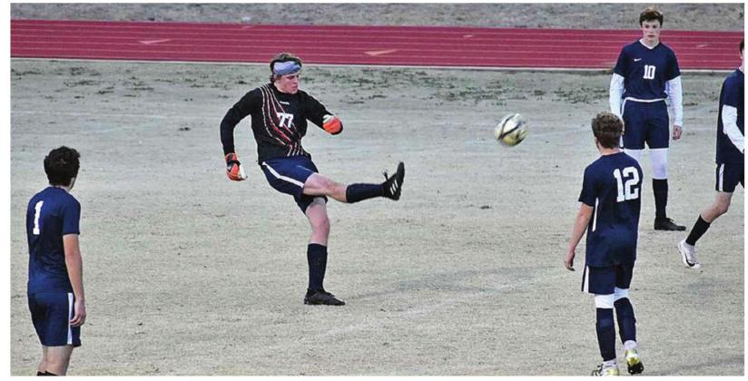 Dakota Miller launches the ball in a 5-1 loss to Chickasha. PHOTOS BY CARLIE BANKS