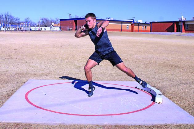 Jasmer shows what powerthrowing a shotput looks like.