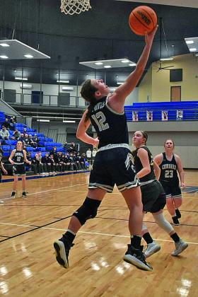 Freshman Ellie Willard goes in for a layup.