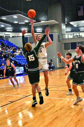 Freshman Kray Rogers sinks a two point shot.