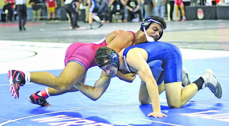 Cordell's Shane Perkins takes on Watonga's Joe Jackson in state wrestling.