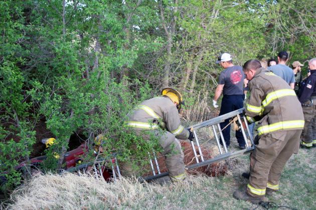 Mock scene: Fire crew prepare to rescue victim