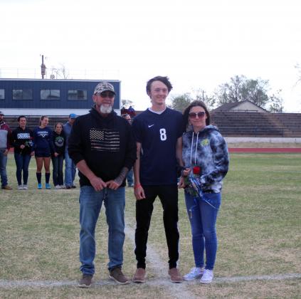 #8 Noah Ramsey, escorted by Carl &amp; Jennifer Ramsey