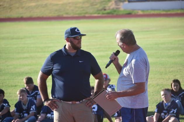 Cordell Head Football Coach Cody Gilmore stands with Pie Auction Emcee Dudley Simpson. Photo courtesy of Charlinda Ogle