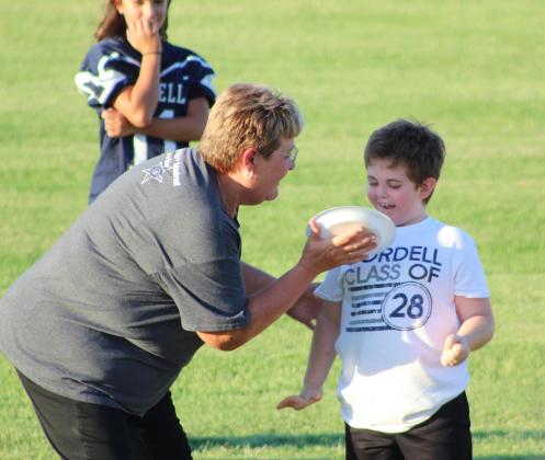 Cordell Educator Charlinda Ogle prepared to pie Kason Javorsky. Photo courtesy of Layne Balzer