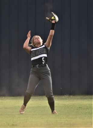 Emma Christian catches the ball in the outfield. Photo by Charlinda Ogle