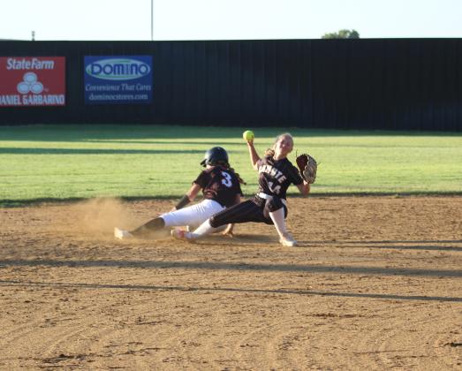 Canute High School's Camri Tabor #14 gets an out against the Bears.