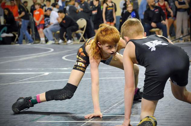 Tyson Dickerson faces his opponent. Tyson fought his way to earning the sixth place title. Photo by Erin Dudgeon.