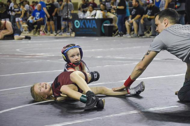 Preslie Dickerson has her opponent in tears. Photo by Erin Dudgeon.