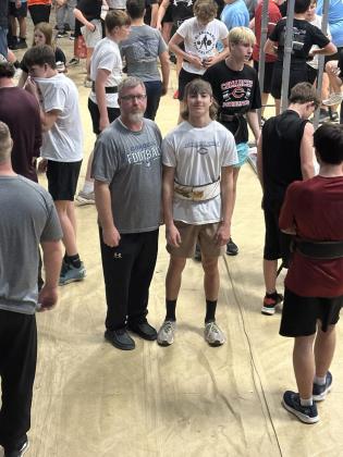 Coach Bruce Munden and Jaxon Jones - Photo by Becca Jones