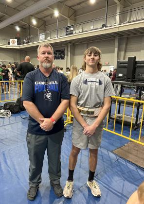 Coach Bruce Munden and Jaxon. Photo courtesy of Becca Jones