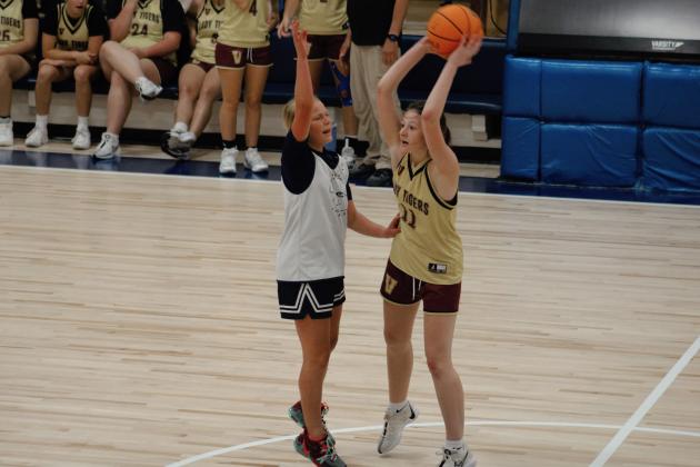 Cordell’s #2 McKinley Moore attempts to block Vernon Lady Tigers’ #11 Keegan Phillips’ pass. Photo by Brooklynn Peek.