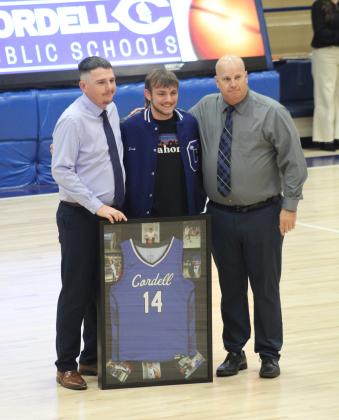 Coach Jakob Moles, Jacob Vela, and Coach JJ Williams. Photo by Brooklynn Peek