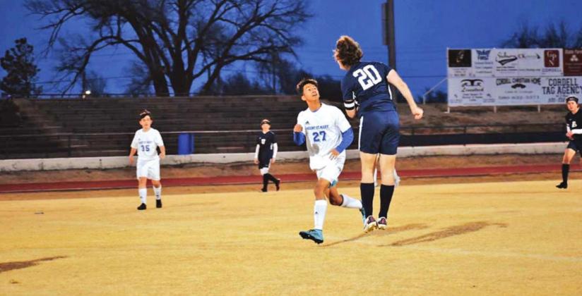 Senior Cameron Cochran heads the ball during a loss to Mount Saint Mary.