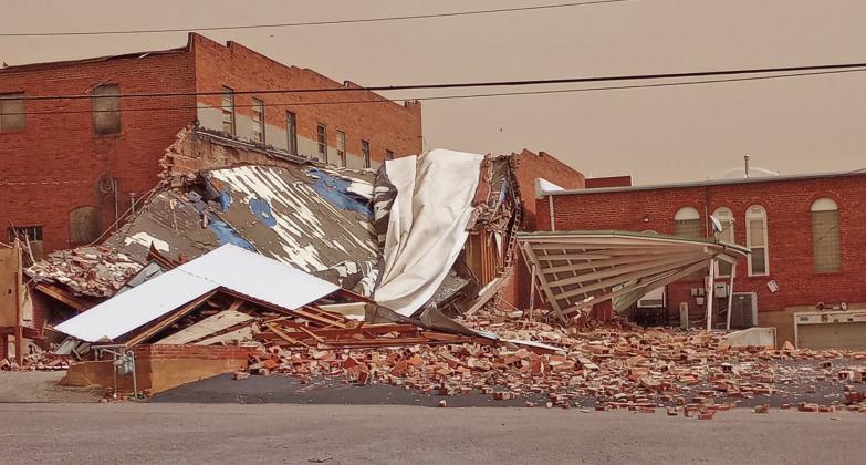 This building located at 114 S. College collapsed under the force of severe winds. The bulding, owned by Zetta Penner, currently served as an apartment with a large garage. The apartment’s resident was home at the time of the collapse but was not injured. At one time the building housed the Amuse U movie theater.