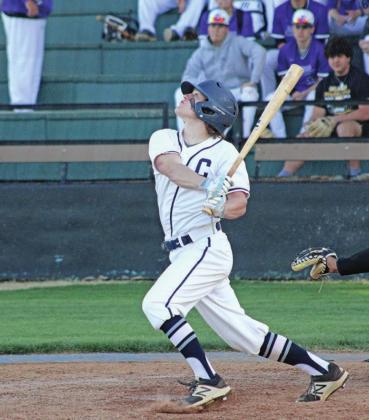 TOP: Corbin watches a successful hit soar through the air