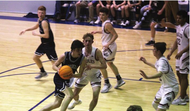 Top left: Brady Reimer scores on a fast break layup. Top right: Bode Gallagher hauls in a rebound. Bottom: Gaige Keister drives around an OCA defender. Bob Henline | Cordell Beacon