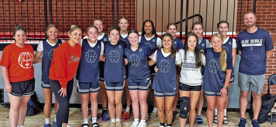 Back row: Head Coach Colby Love, Jacy Webb, Brulie Reeves, Rylee Larsen, Emma Holman, Eva Rennison, Kaziah Wilson, Diane Palmerton, Assistant Coach Kendi Spradlin Front row: McKinley Moore, Mylee Brunker, Rylee Kelly, Calliy Walker, Tralynn White, Kemper Woodis Pop Out: Lady Blue Devils couldn’t suppress their excitement at meeting OSU Women’s Basketball Head Coach Jacie Hoyt