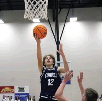 Carsen Nickel scores on a layup. Bob Henline | Cordell Beacon