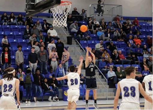Brady Reimer pops a long three pointer against Hobart. Bob Henline | Cordell Beacon
