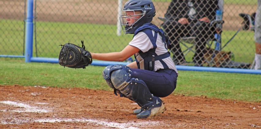 Senior Andrea Palmer playing catcher