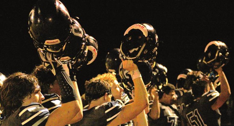 The boys rush over to cheer on the band