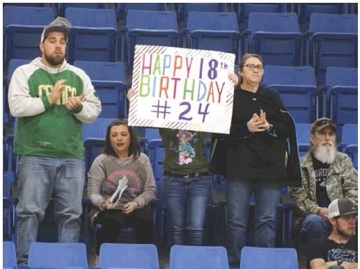 Above: Kamdyn Davis’ family helps celebrate her 18th birthday during Saturday’s game. Bottom left: Evan Anderson grabs an offensive rebound for a put-back score. Bottom center: Kamdyn Davis shoots a three. Bottom right: Bailey Troub goes up for a second-chance score from an offensive rebound. Bob Henline | The Cordell Beacon