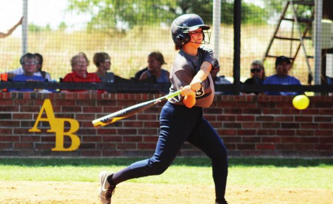 Senior Jade Gonzalez puts some power behind her swing.