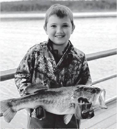 It is easy to see Ethan McDaniel was excited when he caught this 5 pound 4oz bass at Mc-Gee Creek State Park last week. According to his dad, after this picture was taken he said, “Dad, let’s put it back so it will grow bigger!” Photo courtesy of OKDWC