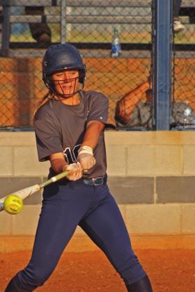 Ellie Willard knocks the ball