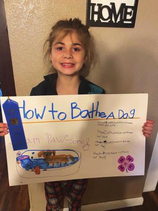 First place Companion Animal poster: How To Bathe A Dog by Kali Bloomer, Cordell Photo courtesy of Dana Church