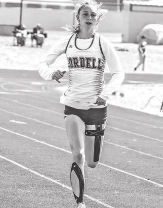 ABOVE: L to R- Pipers mother Tiffani Gallagher, Piper, and father Brandon Gallagher at the football homecoming crowning ceremony LEFT: Piper runs at a recent track meet Changing schools was hard, but Cordell athlete found her groove CONTRIBUTED PHOTOS