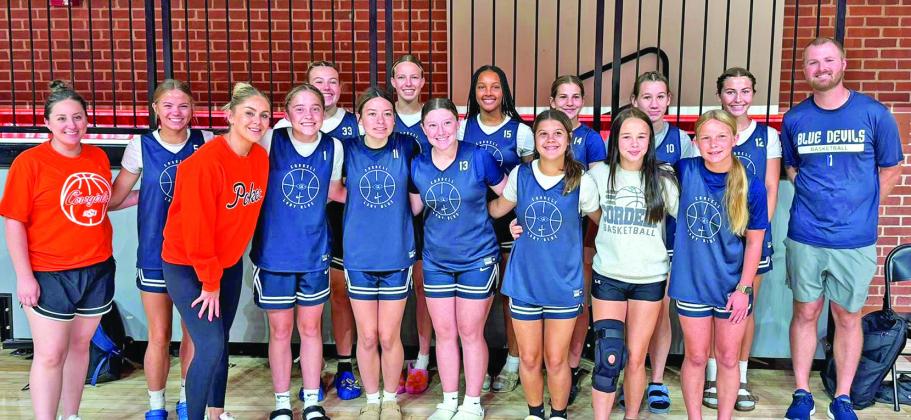 Back row: Head Coach Colby Love, Jacy Webb, Brulie Reeves, Rylee Larsen, Emma Holman, Eva Rennison, Kaziah Wilson, Diane Palmerton, Assistant Coach Kendi Spradlin Front row: McKinley Moore, Mylee Brunker, Rylee Kelly, Calliy Walker, Tralynn White, Kemper Woodis Pop Out: Lady Blue Devils couldn’t suppress their excitement at meeting OSU Women’s Basketball Head Coach Jacie Hoyt