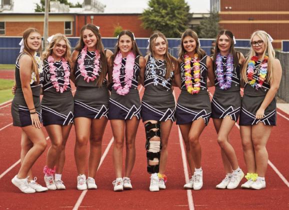 RIGHT: Cordell Cheer decked out in tropical flowers PHOTO BY CHARLINDA OGLE