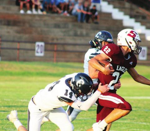 Senior Bode Gallagher drags an Eagle to the ground.
