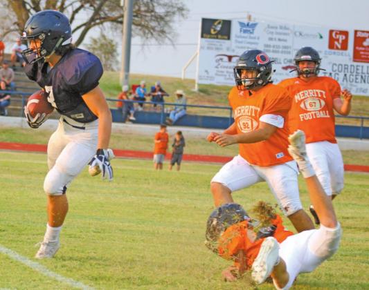 ABOVE LEFT: Blaine Larsen zips away from his opponent in Cordell’s three way scrimmage against Merritt and Watonga.