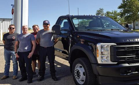 Cordell Fire Department’s Fire Chief Seth Slaughterback, along with firefighters Lincoln Hunter and Mike Morel, stand with Wheeler Ford of Cordell’s David Thaine beside the department’s new brush truck. Once fully completed and equipped, the truck will enhance the department’s ability to better serve and protect the community. The purchase of the truck was fully funded by an equipment grant. PHOTO BY BROOKLYNN PEEK