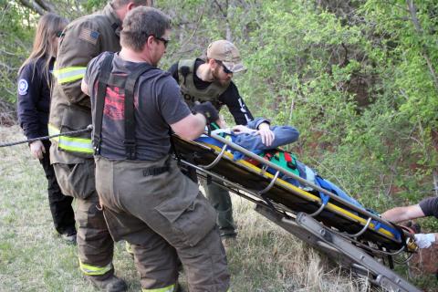 Mock scene: Fire crew and EMS rescue victim from car 