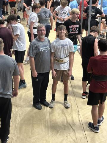 Coach Bruce Munden and Jaxon Jones - Photo by Becca Jones