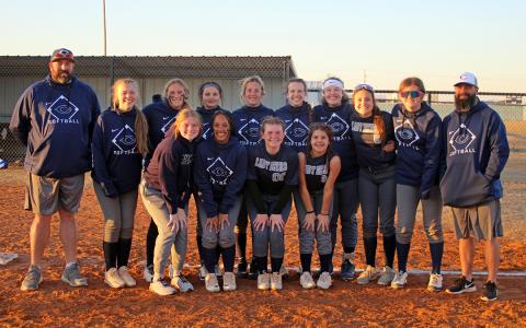 Back row: Head Coach Buddy Holman, Hannah Jones, Natalie Hewitt, Addison Adkins, Brynlie Gray, Rylee Larsen, Emma'Leigh Holman, Chloe Smith, Chaynee Hunter, Assistant Coach Nathan Larsen. Front row: Manager Keagan Brooks, Kaziah Wilson, Kilie Rasmussen, Rylee Kelly. - Photo by Brooklynn Peek