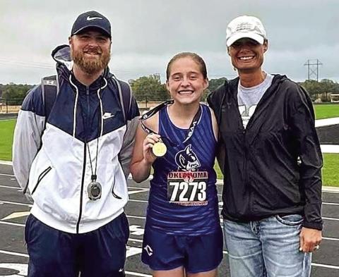 RIGHT: Coach Colby Love, Calliy Walker, and Dean of Students Jana Rogers