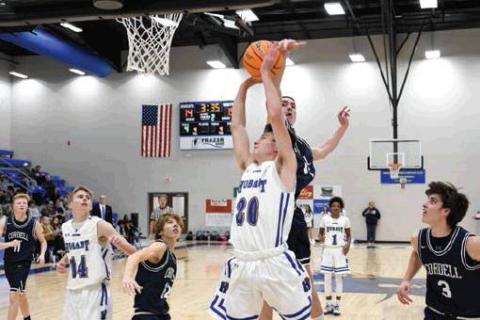 Cordell’s Bode Gallagher blocks a Hobart layup in Friday’s game. Photo courtesy of Todd Hancock | Hobart Democrat-Chief