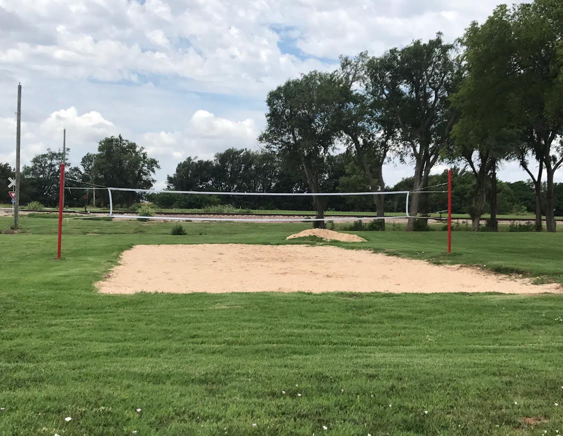 Children, teens, and adults alike will enjoy playing volleyball at the new court.