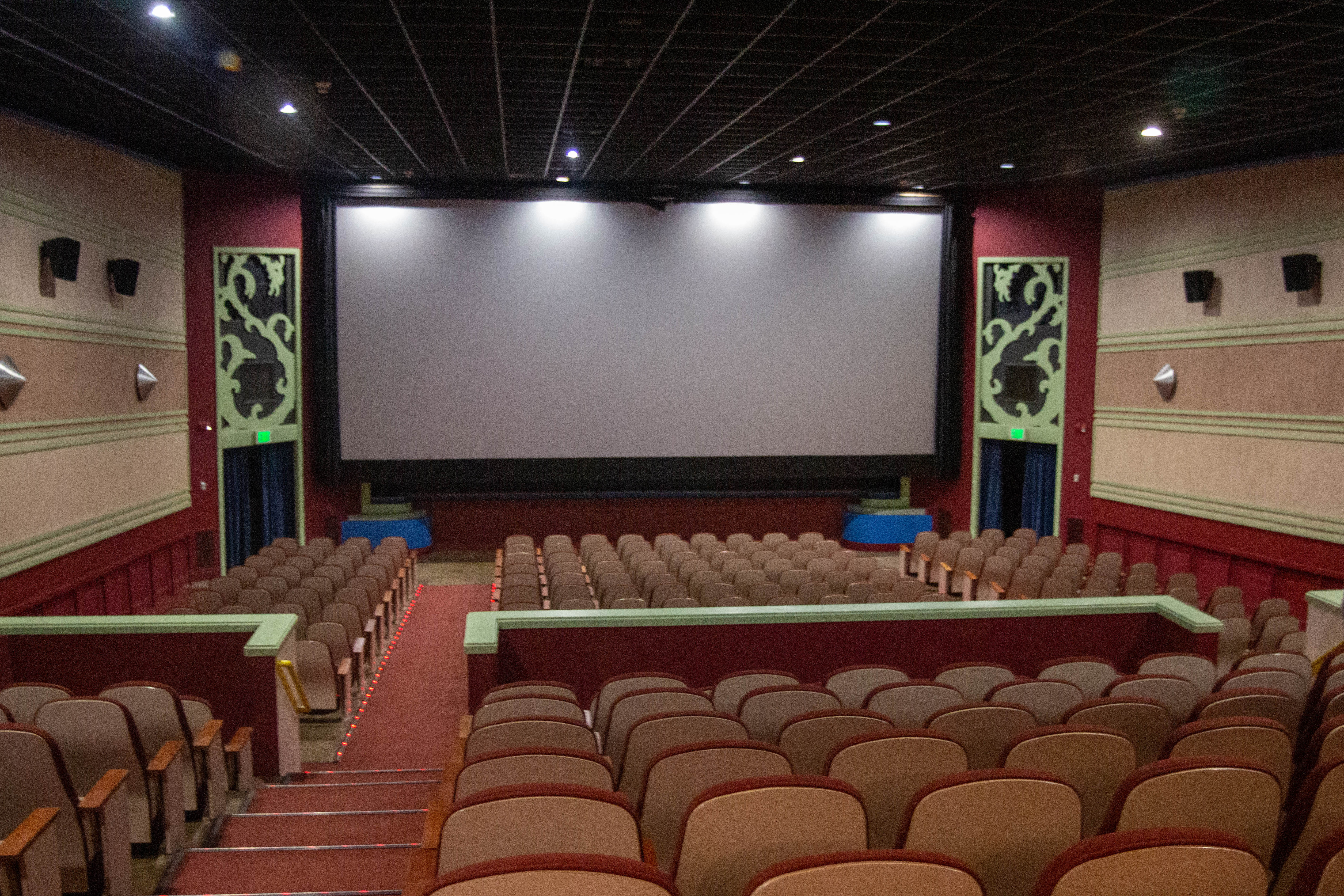 The spacious art deco styled auditorium offers plenty of room to spread out and enjoy the movie and could also provide space for large meetings or presentations.