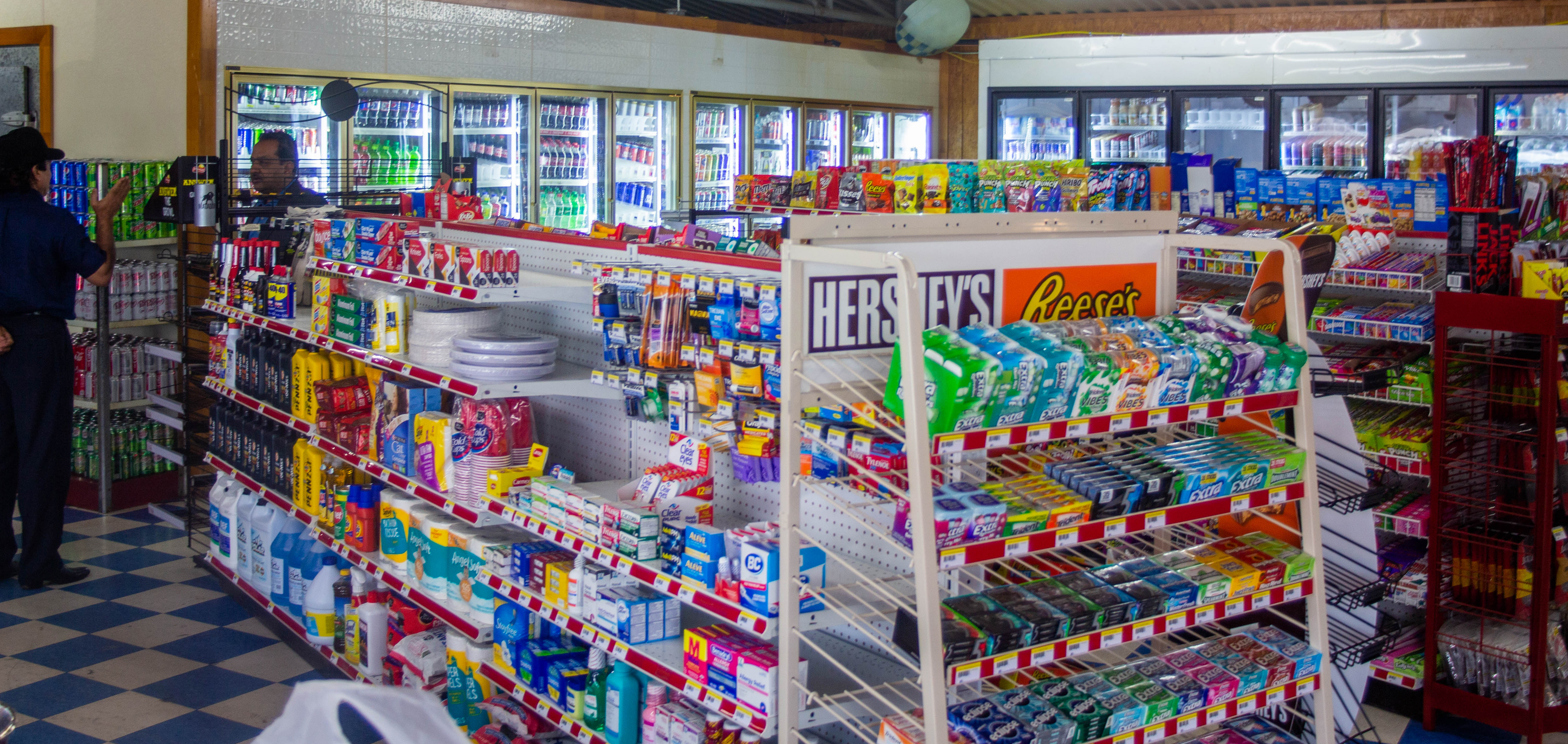 Shelves stand stocked with candy and snacks ready for purchase at the Cordell Plaza. PHOTO BY HECTOR LUCAS