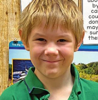 KYLIN DALLAS:  I would show someone I love them by hugging.