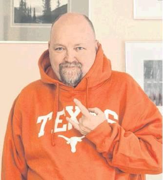 Cordell Beacon editor Bob Henline learned a hard lesson about gambling, donning a Texas hoodie and flashing the “hook ‘em horns” after betting on Utah to beat Texas in the 2019 Alamo Bowl. Heather Flores | The Cordell Beacon