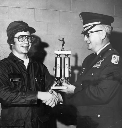 Major Gen. David C. Matthews presenting winner of the Oklahoma National Guard individual competition to Specialist Kenneth Kliewer.